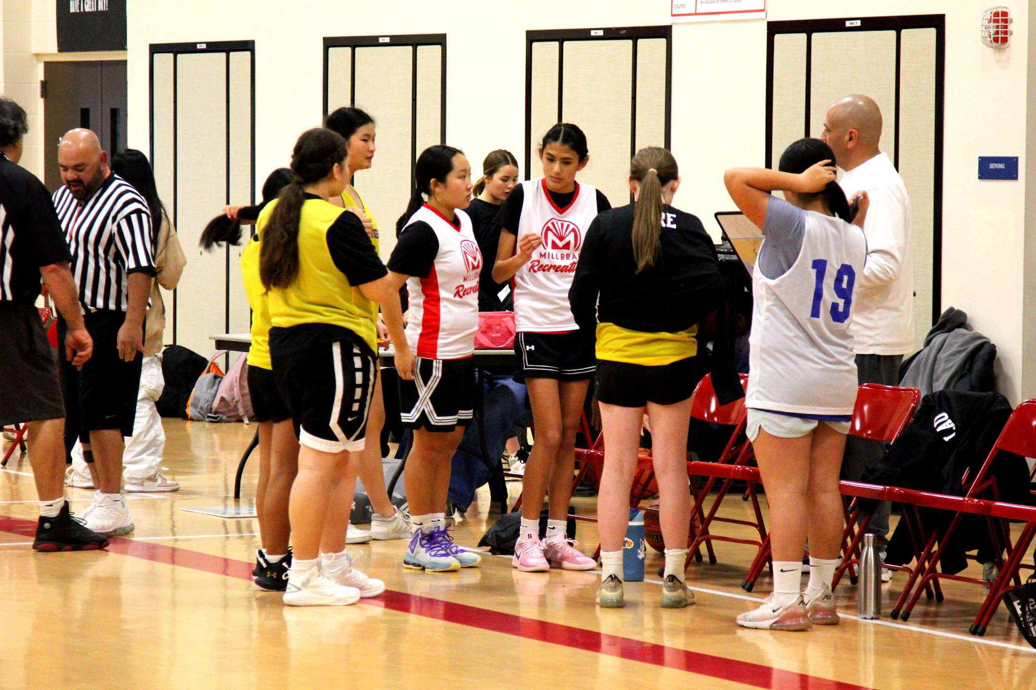 Basketball team huddle